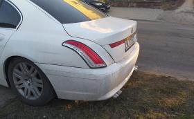 Какво ще кажете за това BMW Серия 7 E65 със стопове от… Lancia Delta?